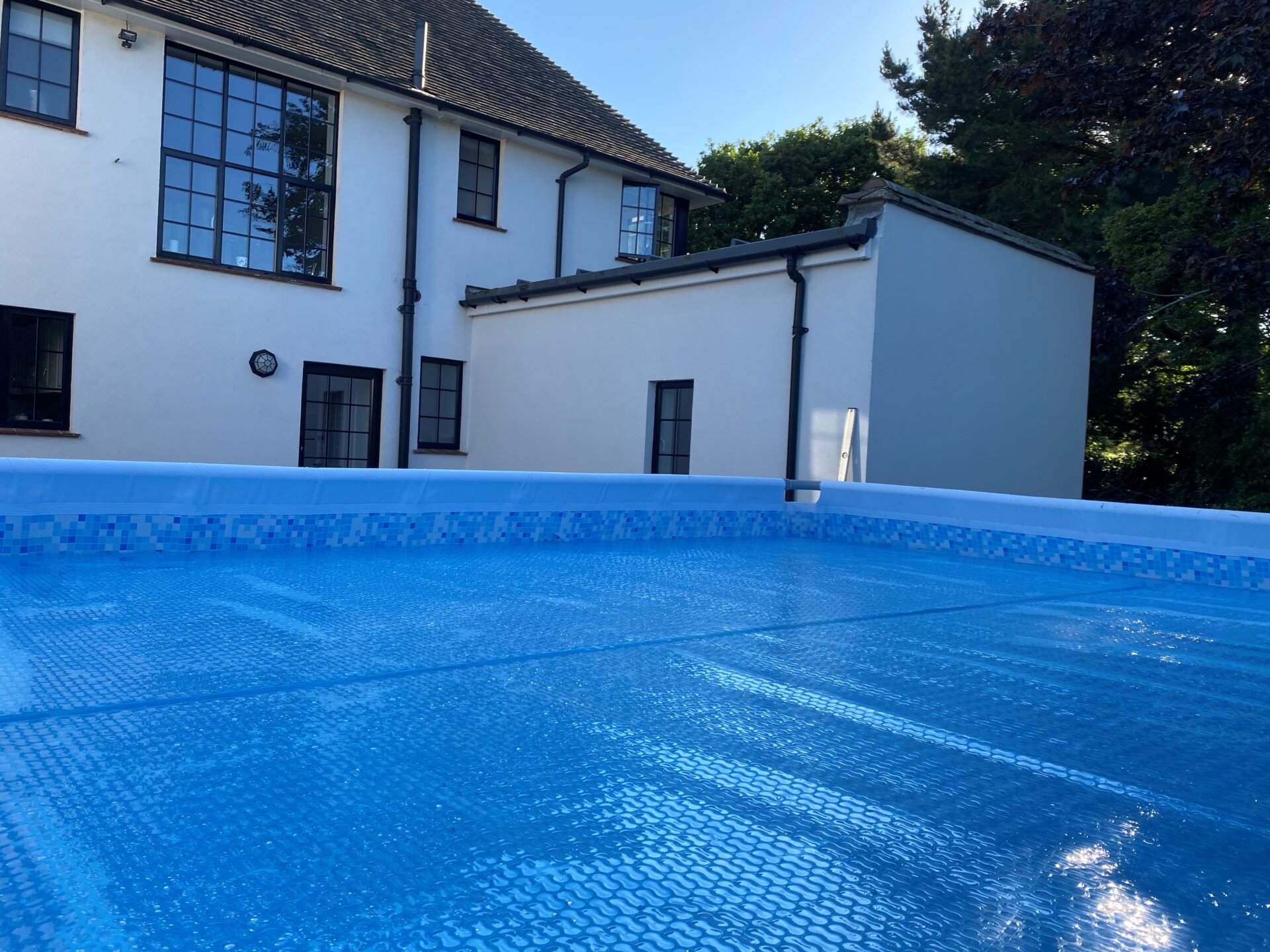 light blue geobubble cover on domestic pool